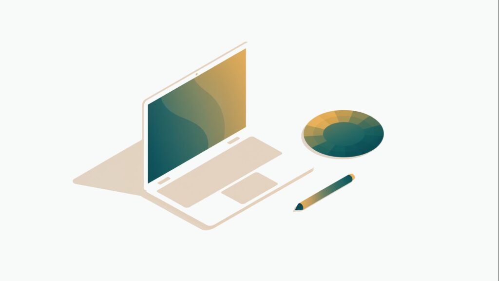 Laptop do grafiki z kołem kolorów i rysikiem — stanowisko twórcze